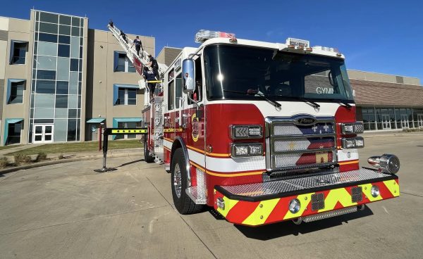 Youngsville Fire Department Fire Truck in front of a building